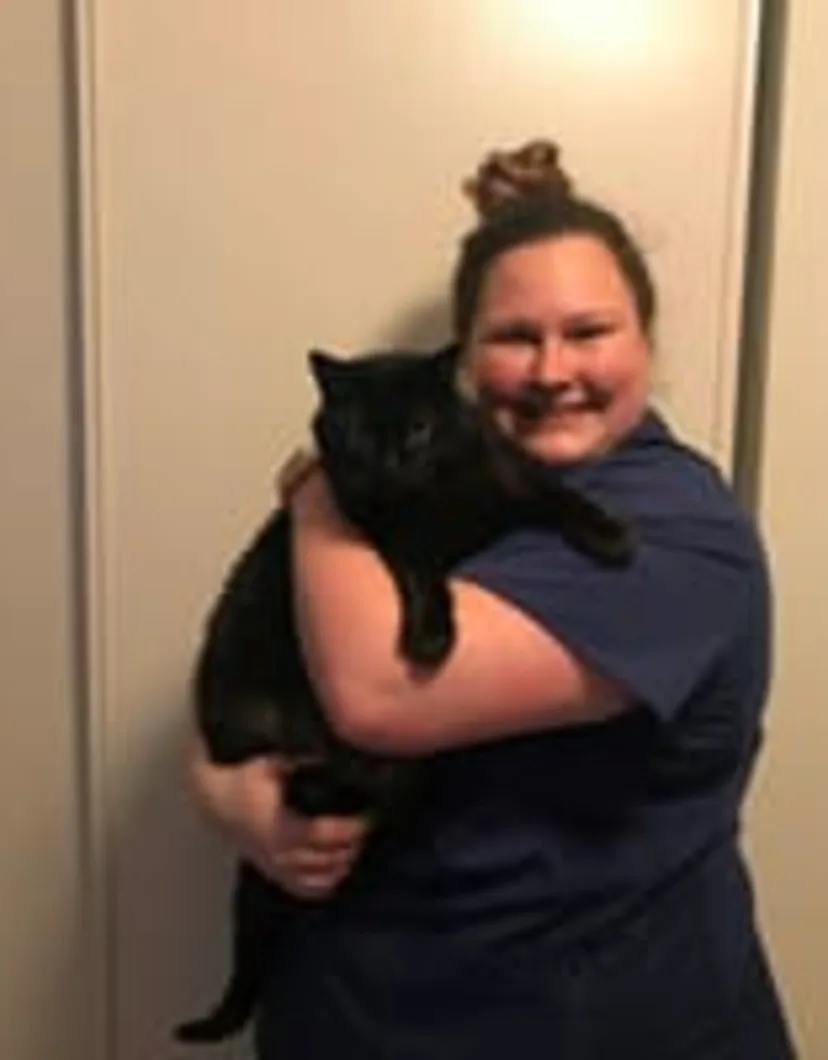 Caroline holding black cat