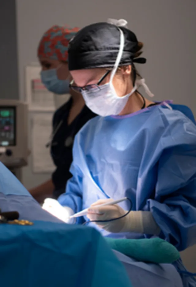 Doctor during surgery with light