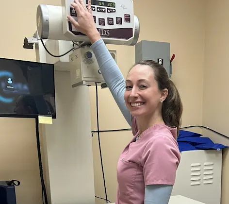 Meg next to an x-ray machine Meg next to an x-ray machine