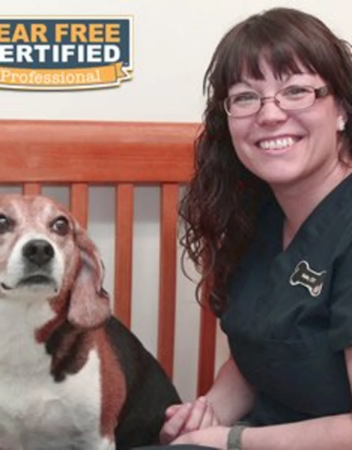 Audra sitting next to a dog Audra sitting next to a dog