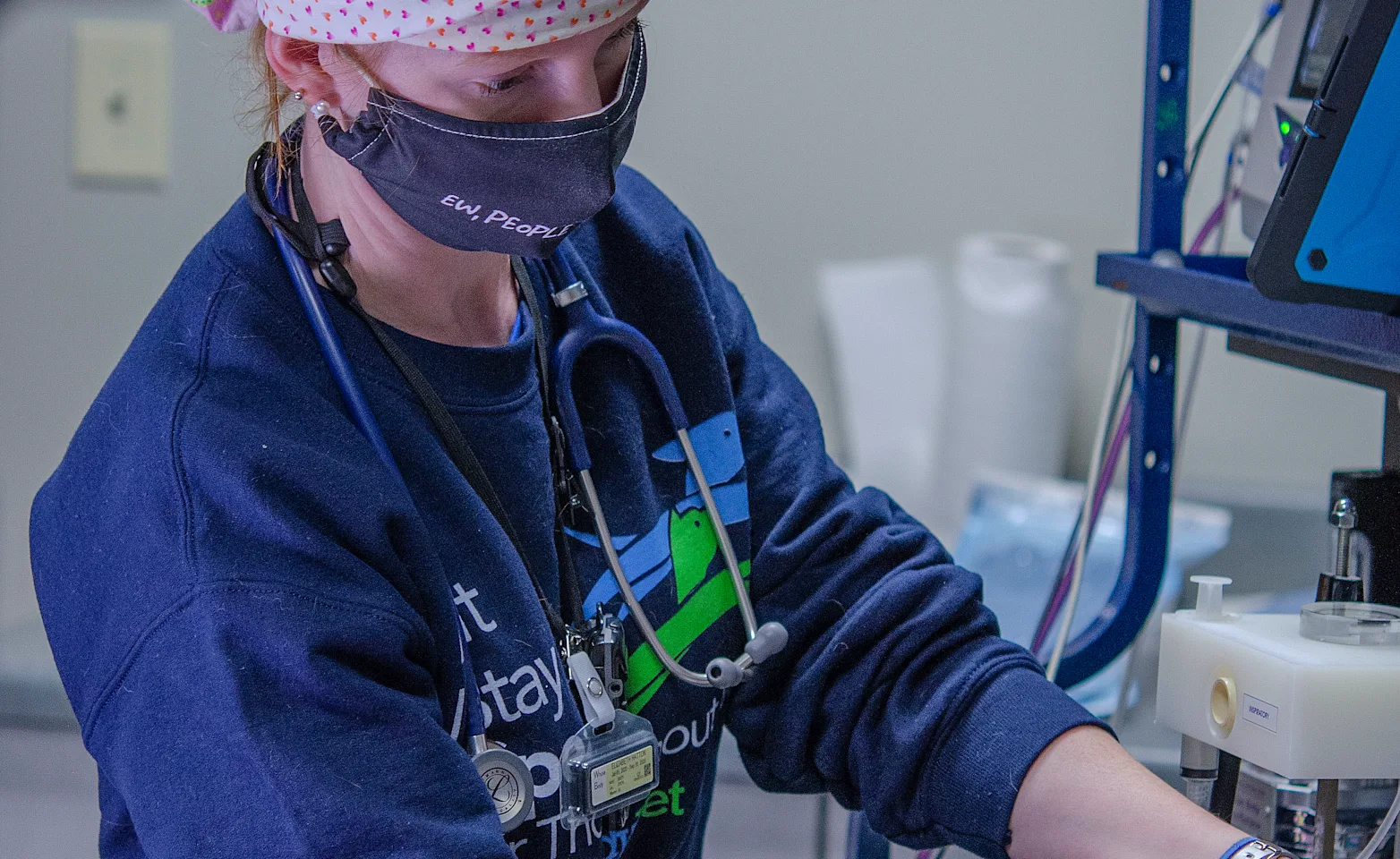 Vet Tech with an anesthesia machine Vet Tech with an anesthesia machine