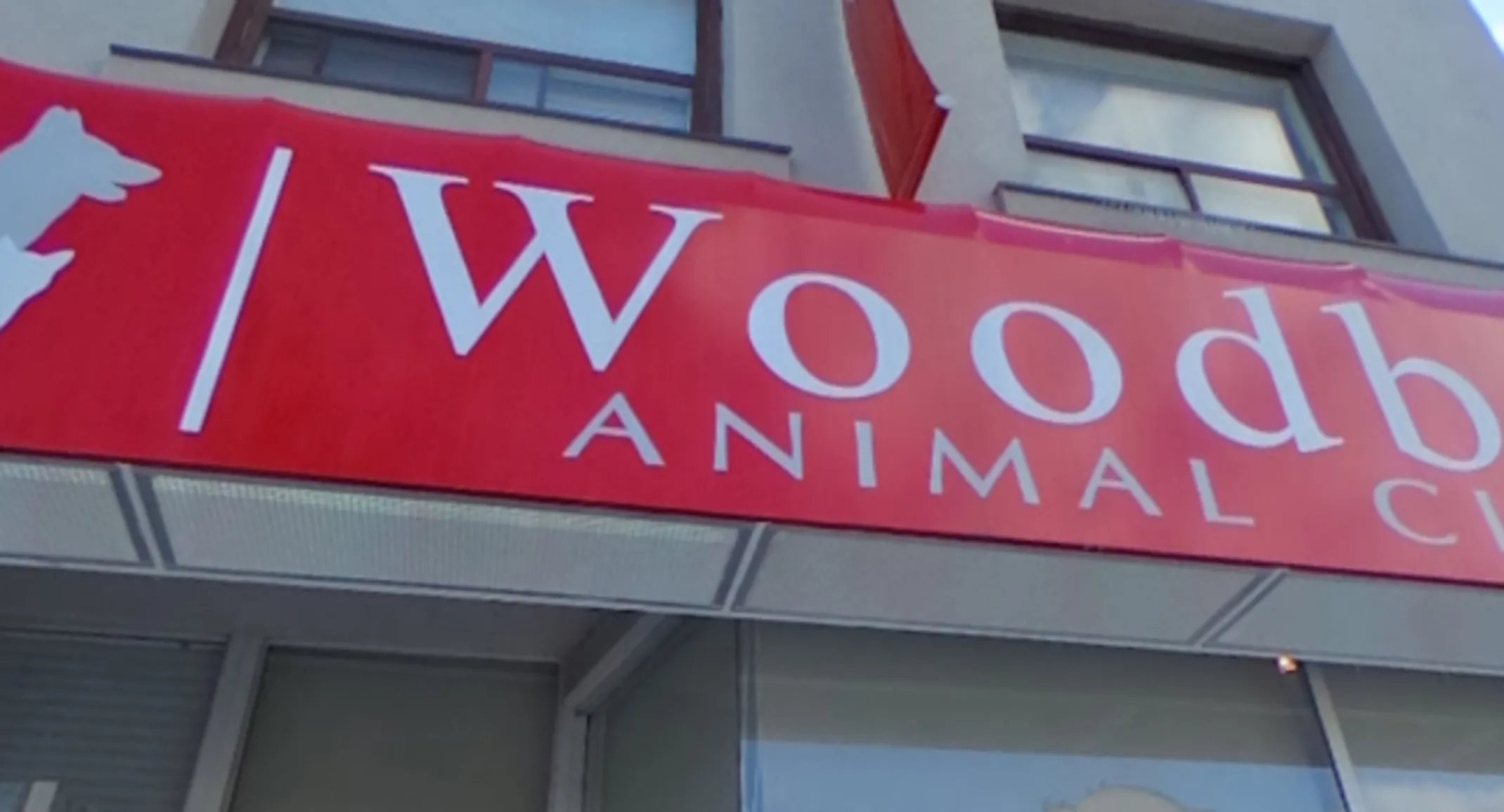A photo of Woodbine Animal Clinic logo outside their building. A photo of Woodbine Animal Clinic logo outside their building.
