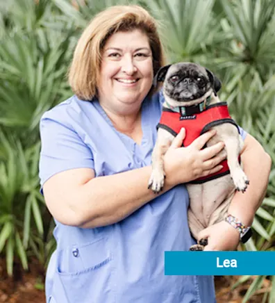 Staff member with dog Staff member with dog