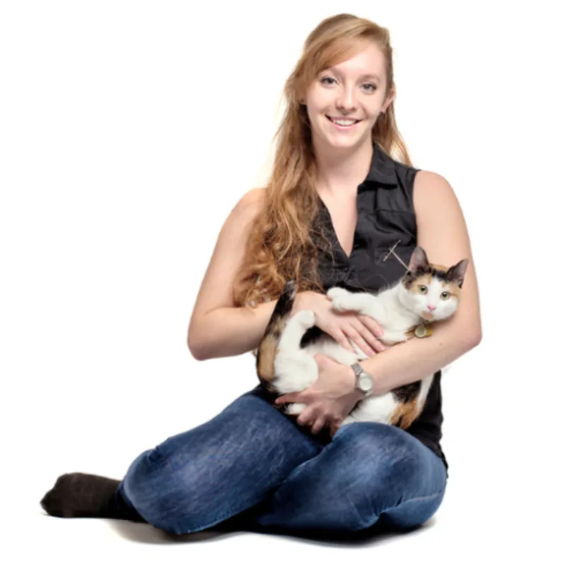 A portrait photo of Dr. Cassandra Van Engelen with her cat A portrait photo of Dr. Cassandra Van Engelen with her cat