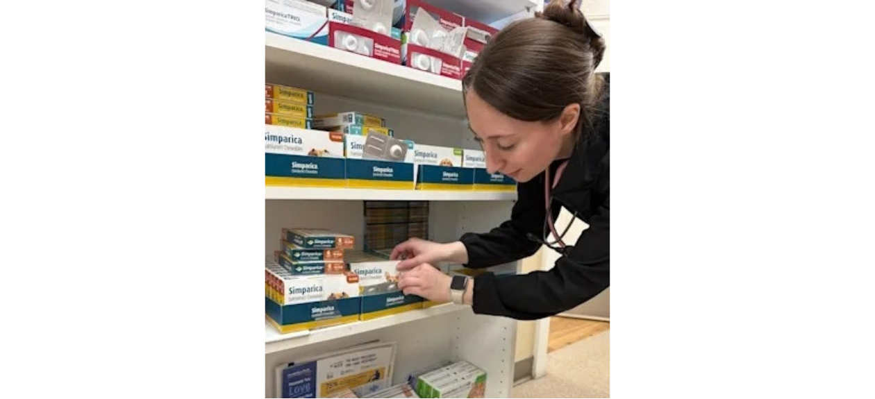 Staff Looking at Parasite Prevention Medication