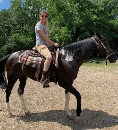 Veterinary Technician Neomi on a horse. Veterinary Technician Neomi on a horse.
