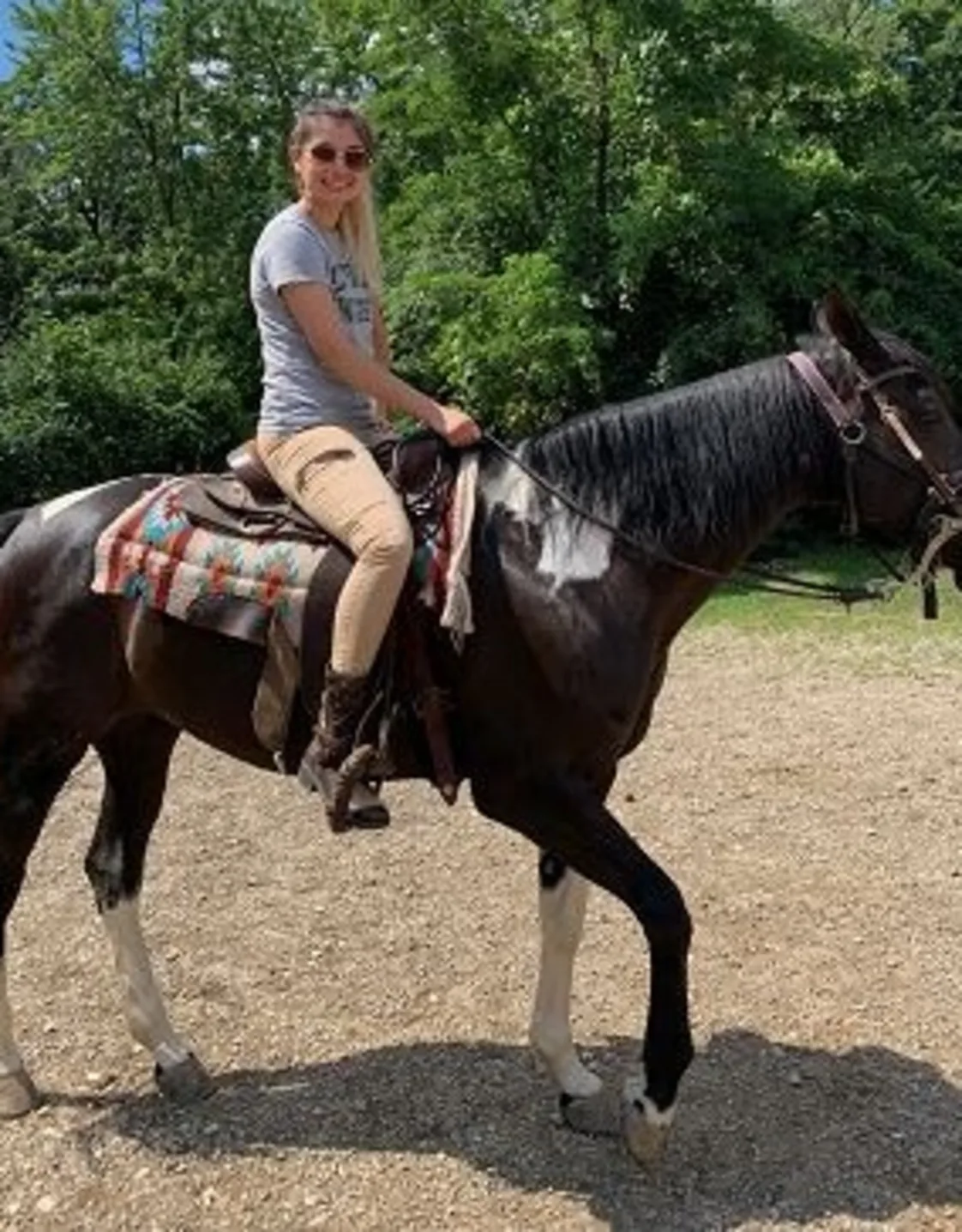 Veterinary Technician Neomi on a horse. Veterinary Technician Neomi on a horse.