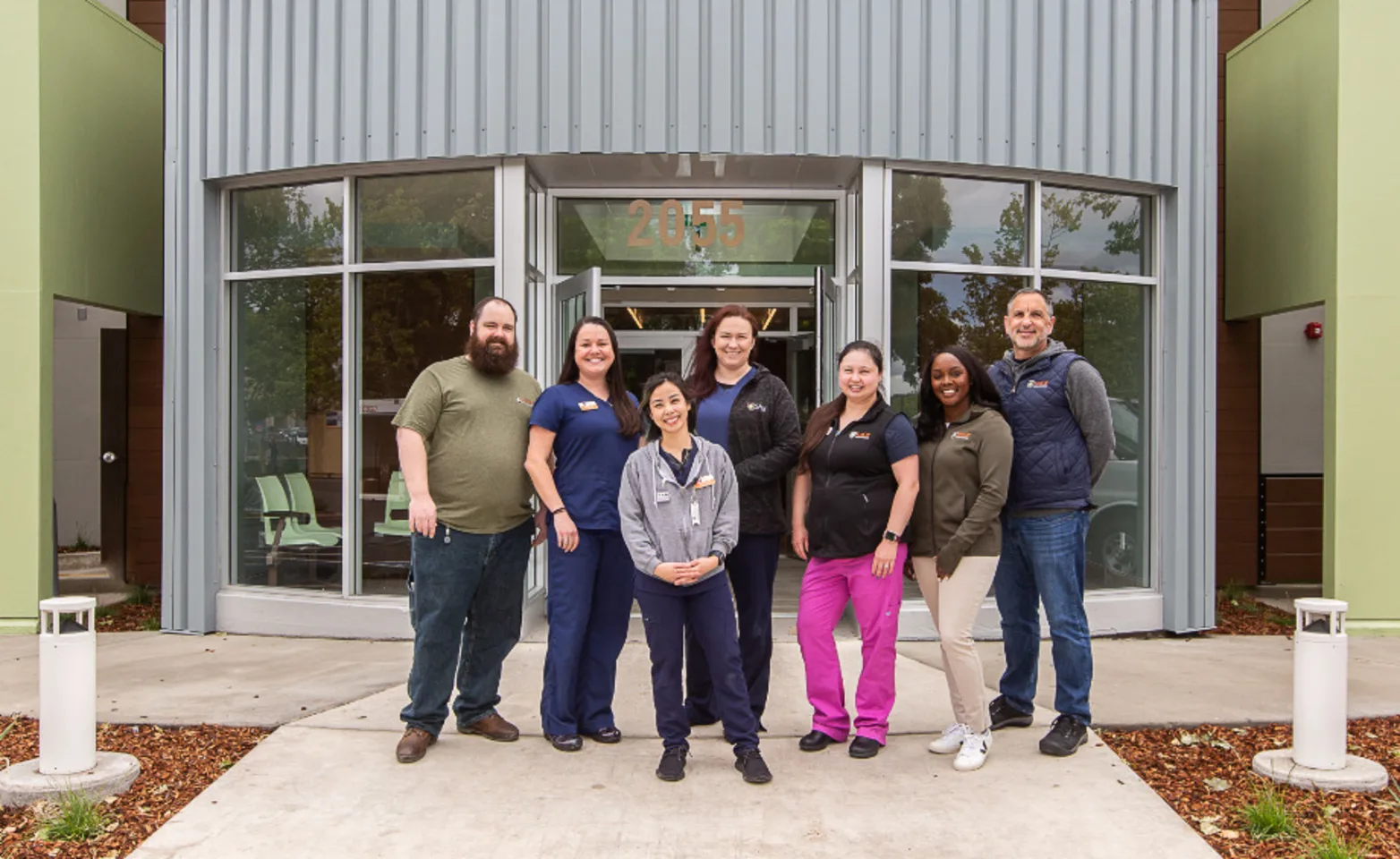 7 Doctors Standing Outside SAGE Veterinary Center - Concord