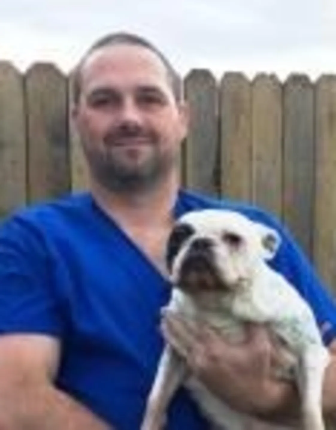 Josh holding a dog Josh holding a dog