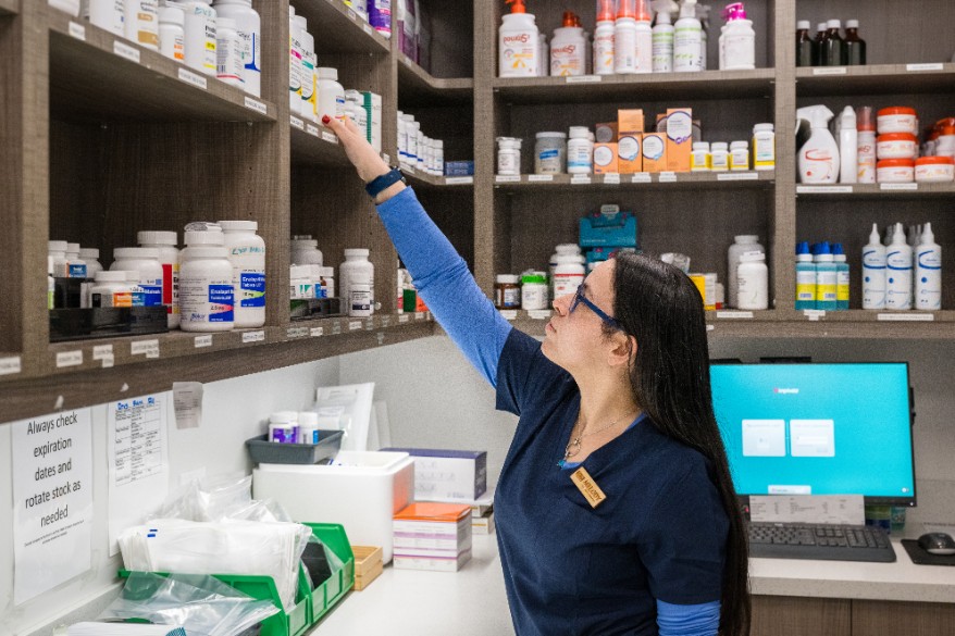 Staff Member Reaching for Medicine