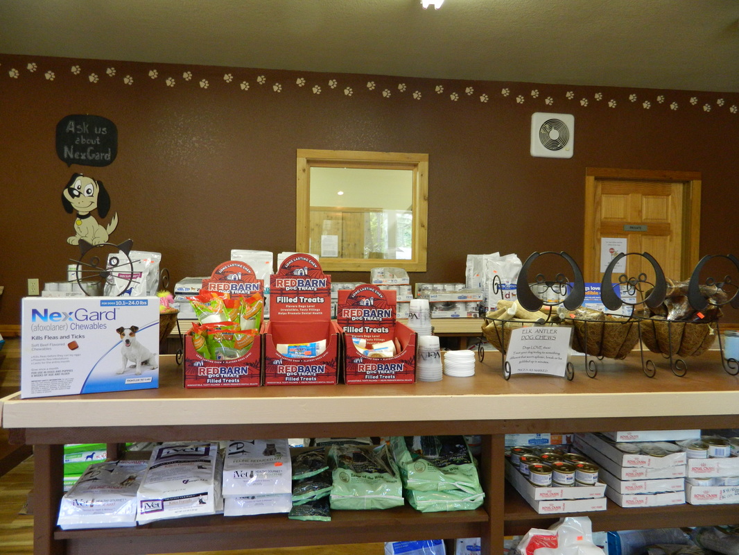 An assortment of dog food available at All Creatures Veterinary Clinic