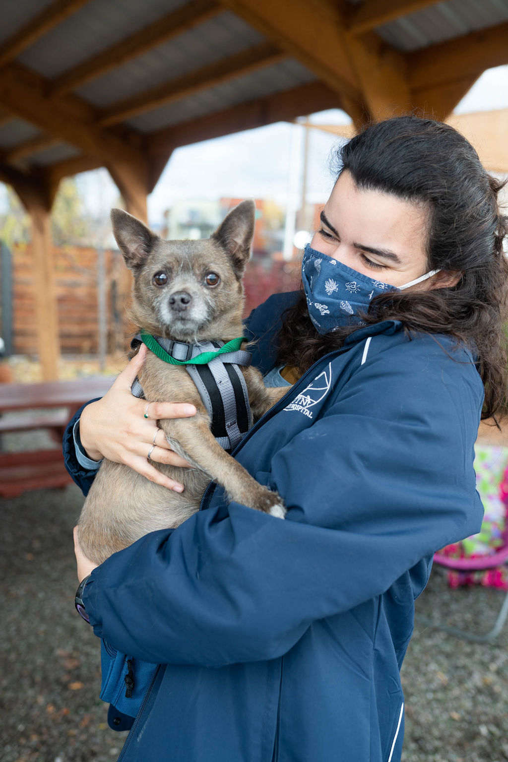  Staff holding dog