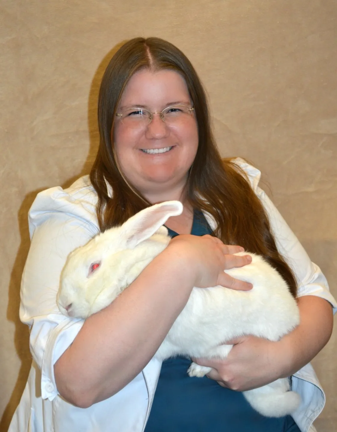 Lange Veterinary Center Dr. Monica Baker with bunny Lange Veterinary Center Dr. Monica Baker with bunny