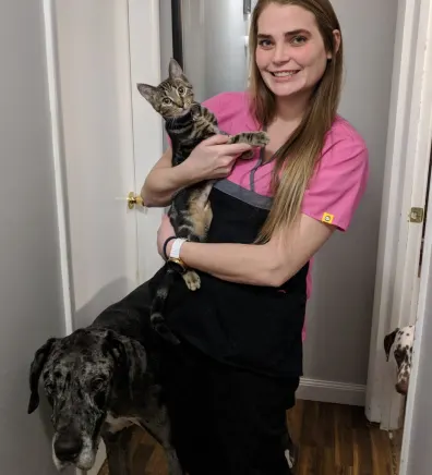 College Mall Veterinary Hospital Ally with cat and large dog