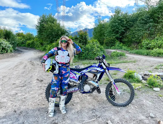 Our Hospital Director, Robyn Luscombe, standing next to a motorbike. Our Hospital Director, Robyn Luscombe, standing next to a motorbike.