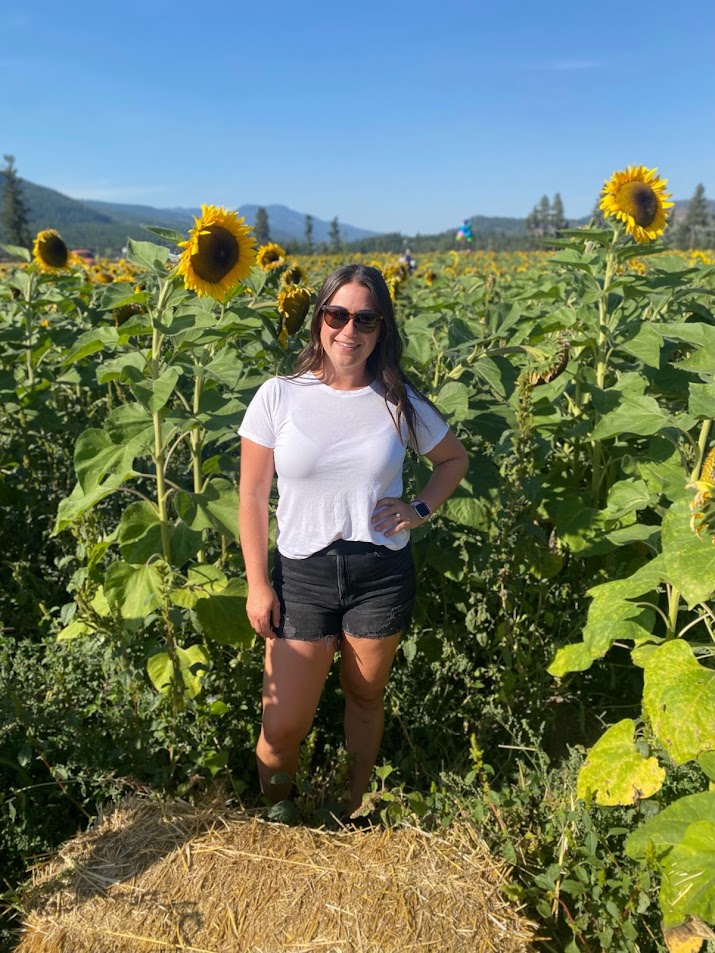 Eagleview Team Member in a Sunflower Field