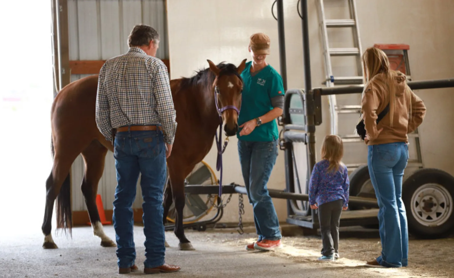 Horse with client and child Horse with client and child