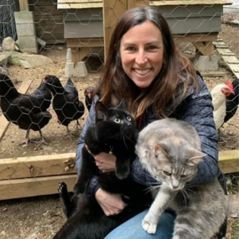 Dr. Melanie Sigetich with her two cats and chickens Dr. Melanie Sigetich with her two cats and chickens