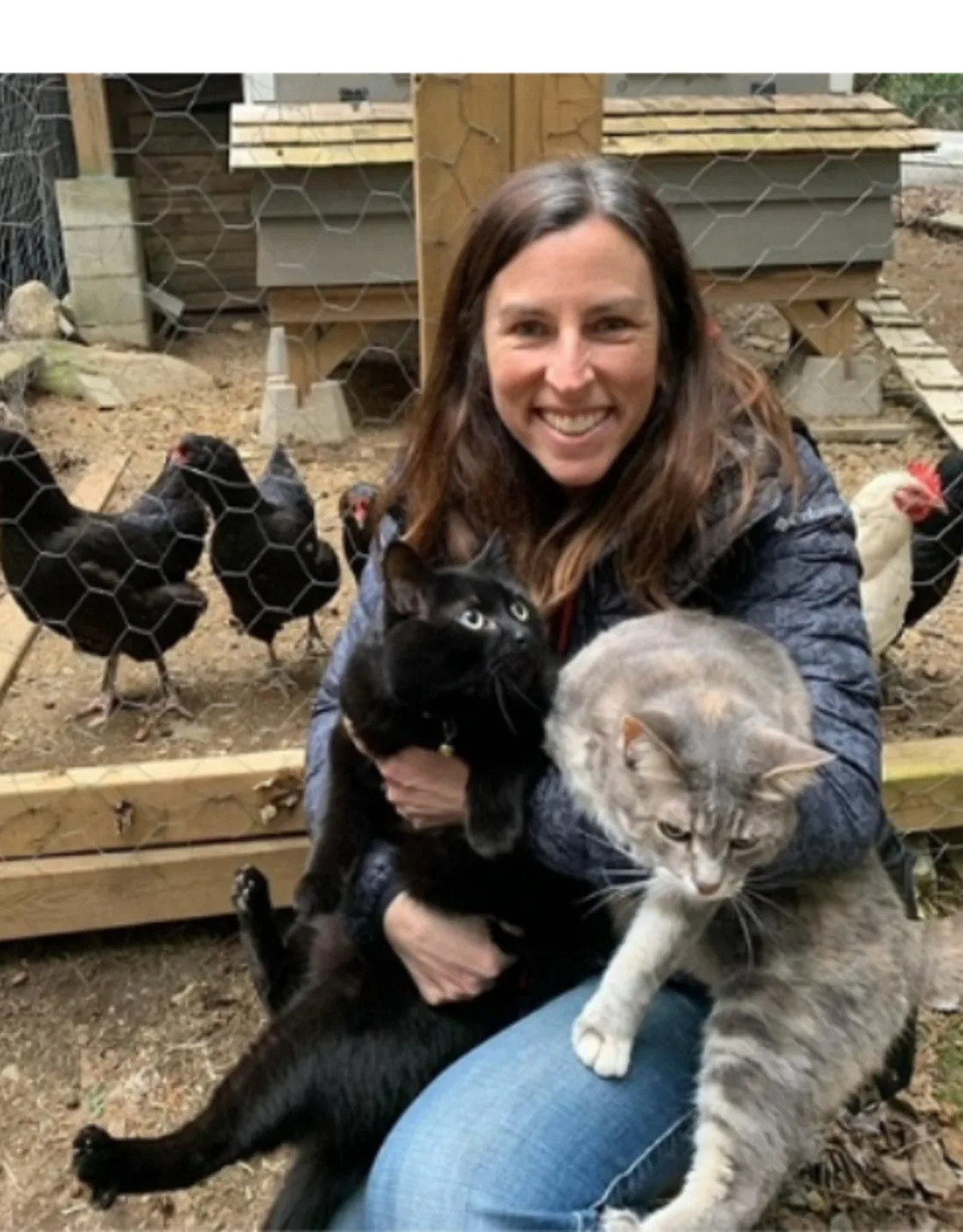 Dr. Melanie Sigetich with her two cats and chickens Dr. Melanie Sigetich with her two cats and chickens