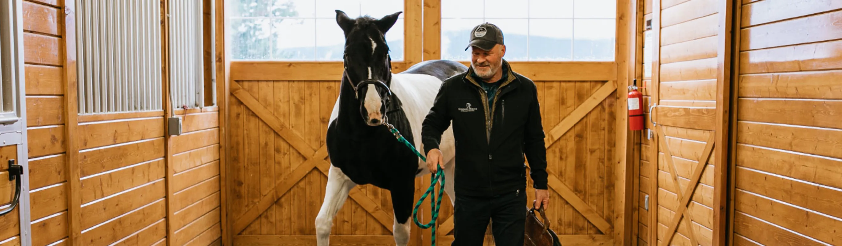 Dr. Howell checking up on a horse. Dr. Howell checking up on a horse.
