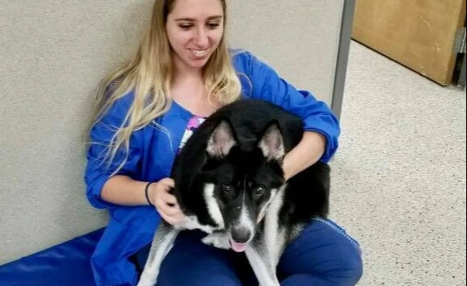 Two women with a dog