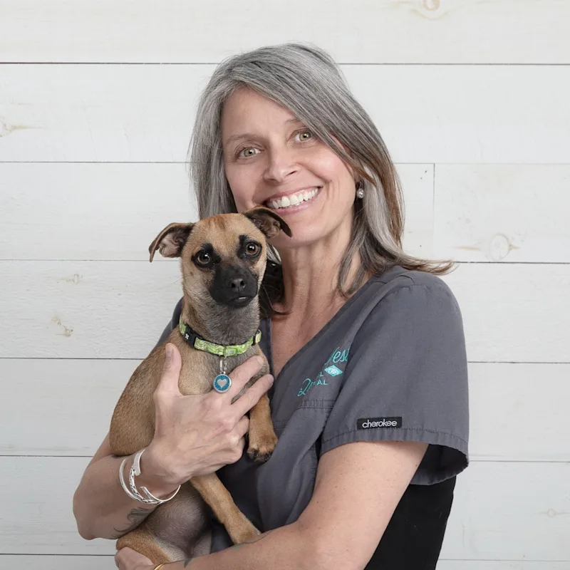 Angie holding a dog Angie holding a dog