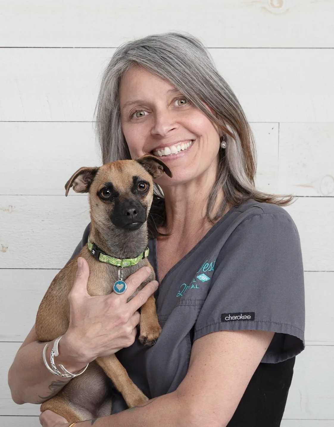 Angie holding a dog Angie holding a dog
