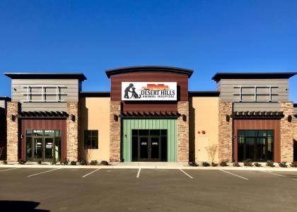 Desert Hills Animal hospital exterior image with wide shot angle and parking lot