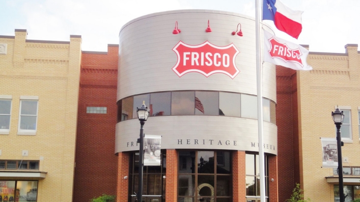 Water silo with Frisco labeled on the front.