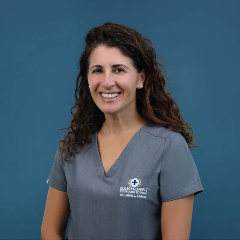 Dr. Laura Leanza holding a pug Dr. Laura Leanza holding a pug