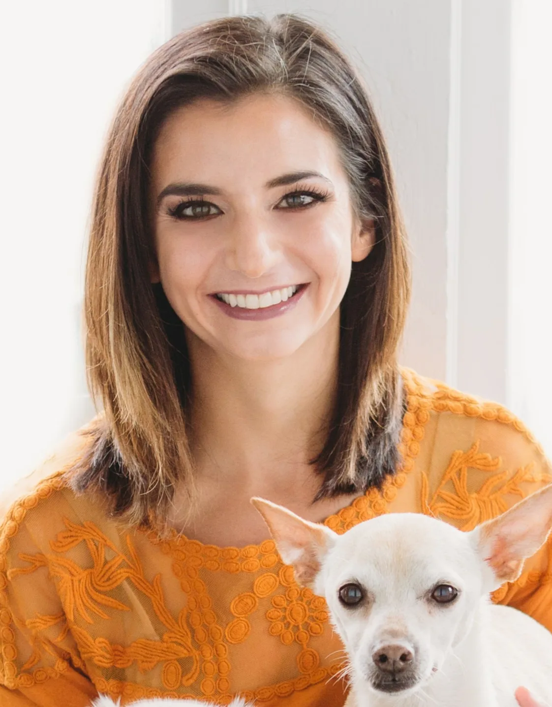 Theresa Pancotto holding two dogs Theresa Pancotto holding two dogs
