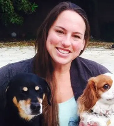 Ashley with two small dogs Ashley with two small dogs