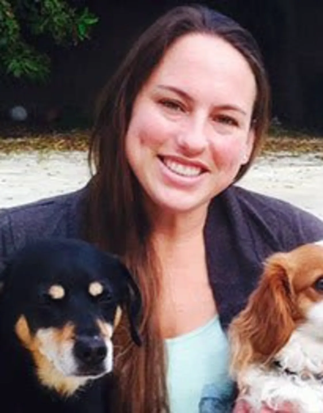 Ashley with two small dogs Ashley with two small dogs