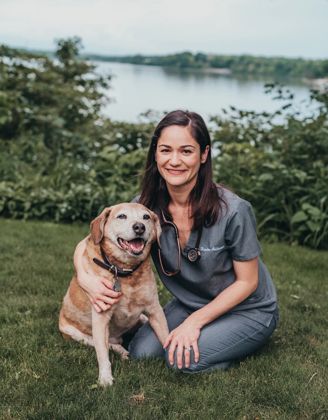 Dr. Ardisana with a dog Dr. Ardisana with a dog