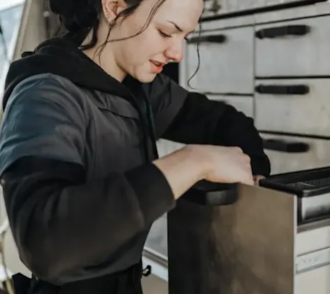 Staff Examining Drawer in a Car Staff Examining Drawer in a Car