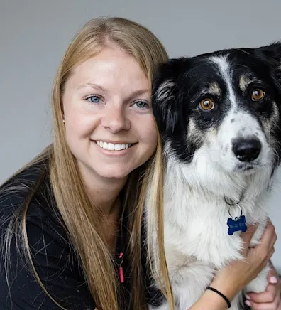 Chantel holding into a border collie. Chantel holding into a border collie.