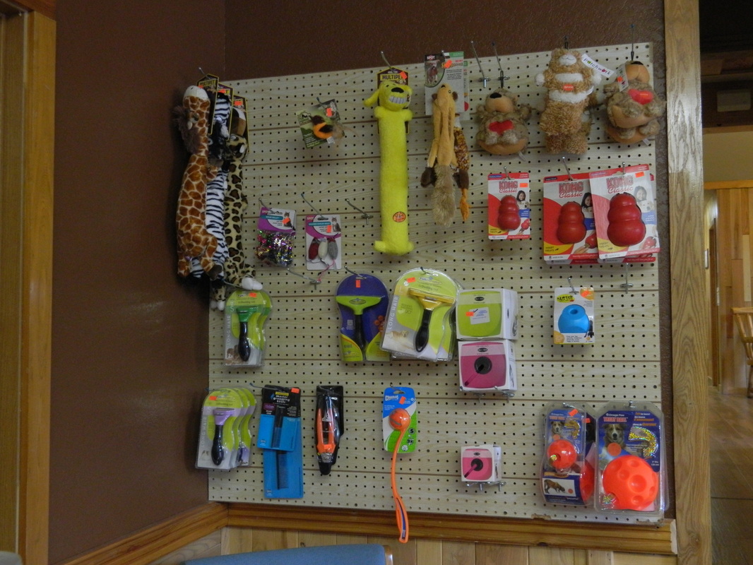 An assortment of dog toys available at All Creatures Veterinary Clinic
