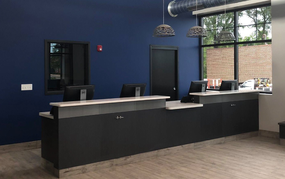 Reception desk and blue wall at Carriage Animal Hospital