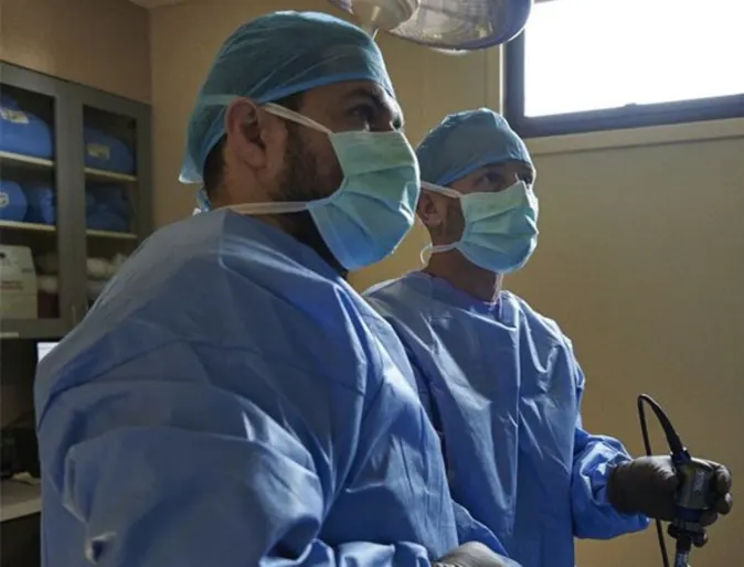 Two doctors looking forward Two doctors looking forward
