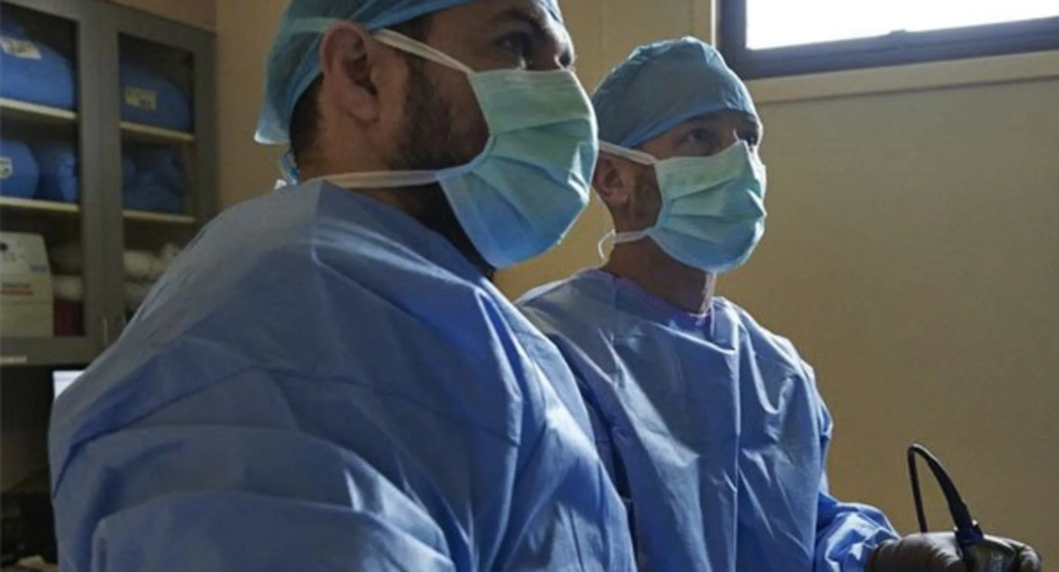 Two doctors looking forward Two doctors looking forward