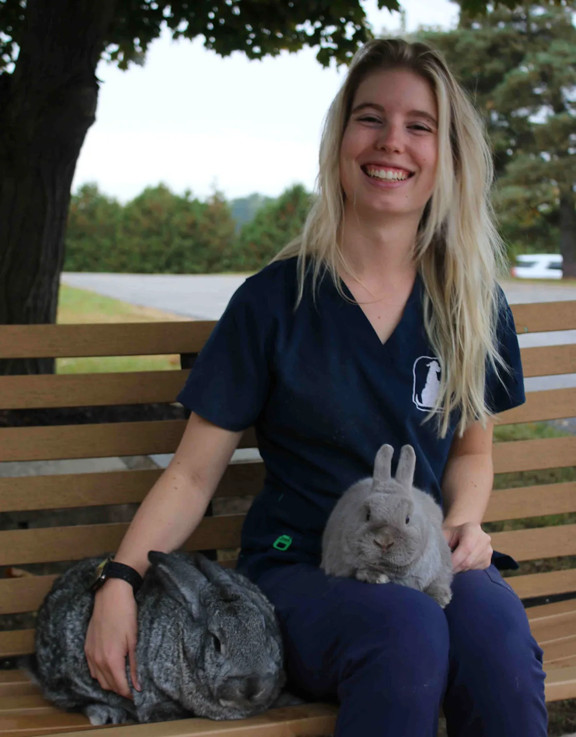 Kaisha hugging a brown dog Kaisha hugging a brown dog