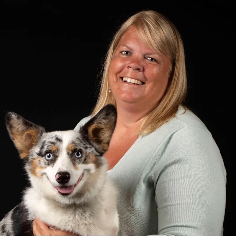 Amy W. holding corgi Amy W. holding corgi