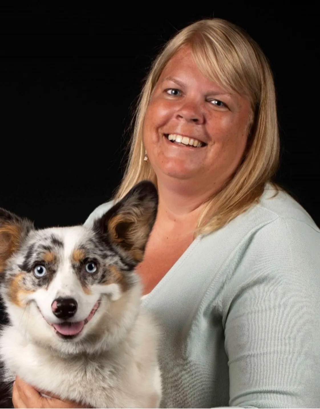 Amy W. holding corgi Amy W. holding corgi