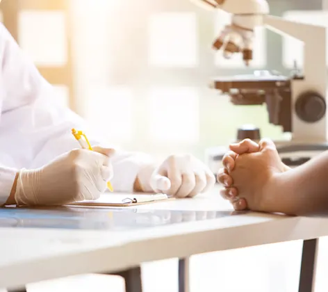Two veterinary professionals reviewing paperwork Two veterinary professionals reviewing paperwork