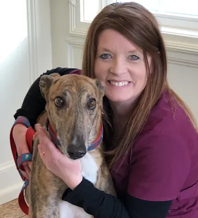 Tina S. with dog at Middlesex County Animal Hospital