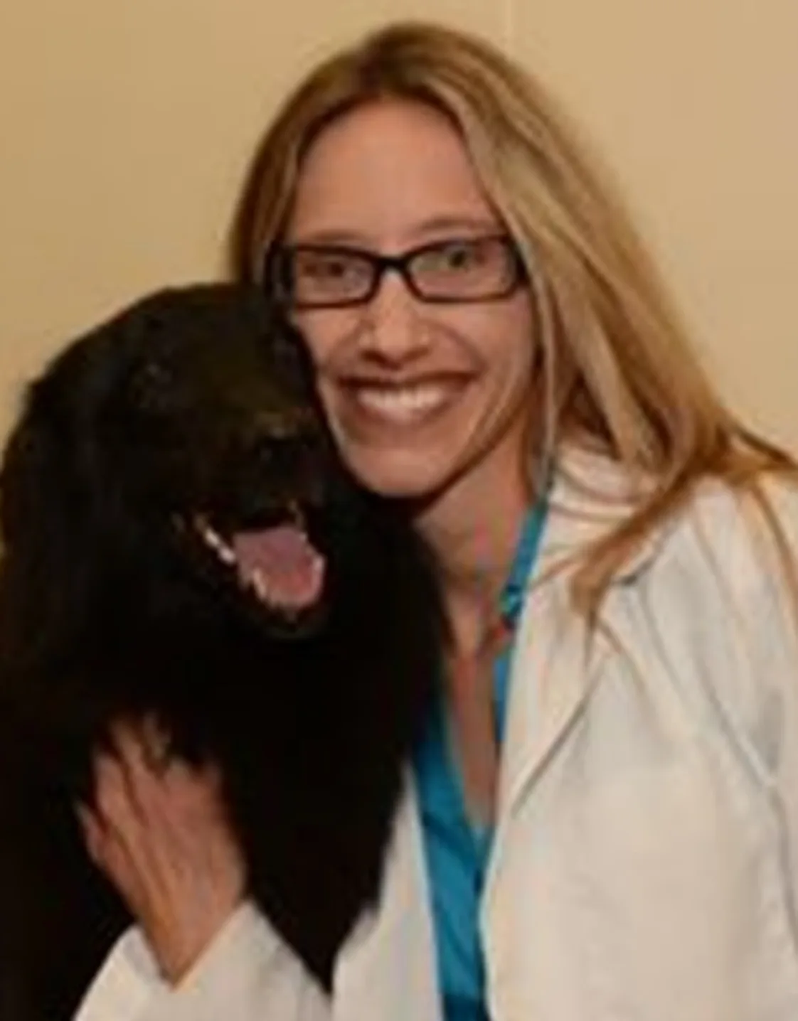 Dr. Dana Nelson with black dog Dr. Dana Nelson with black dog
