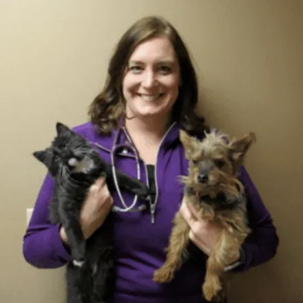 Dr. Jaleen Brunner-Flitz holding a cat and a dog