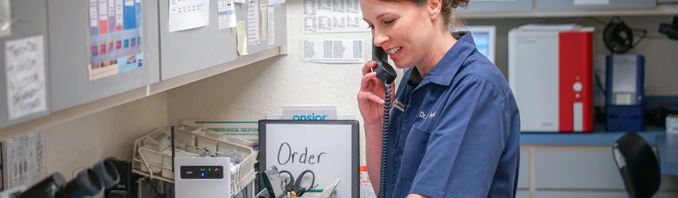 staff member on phone