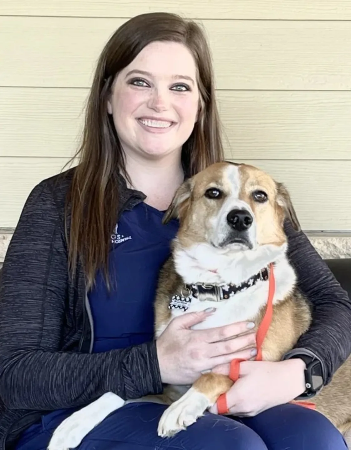 Chelsey Davis with a tan and white dog Chelsey Davis with a tan and white dog