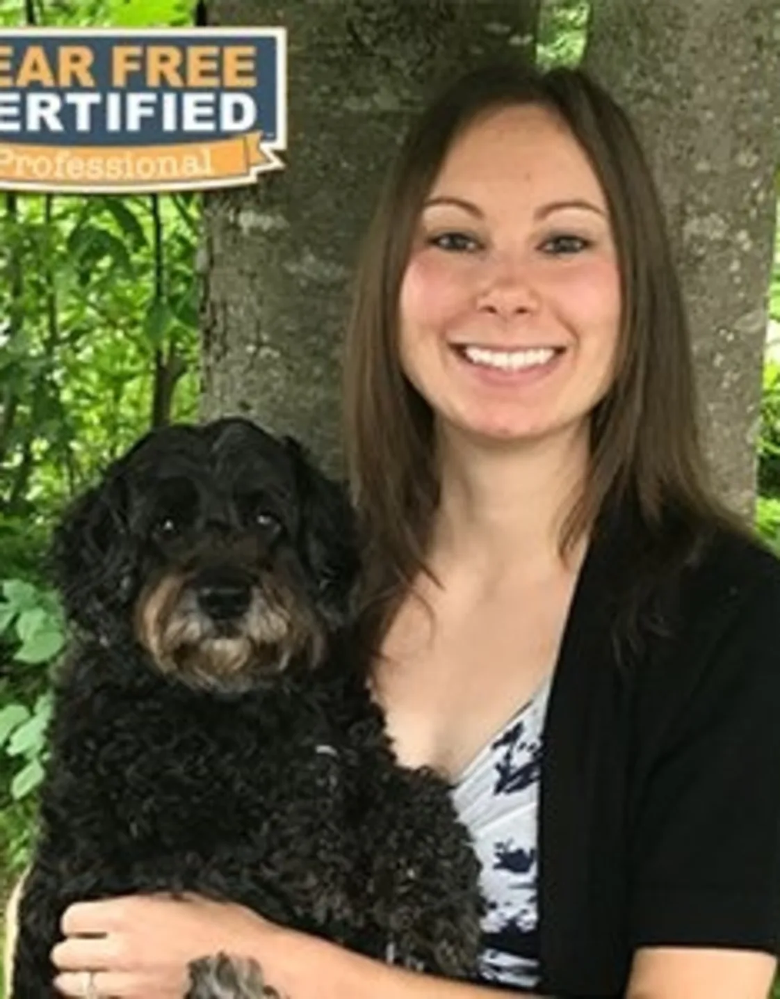 Dr. Dominique Peel holding dog Dr. Dominique Peel holding dog